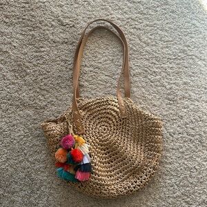 Straw beach bag purse with decorative attachment
